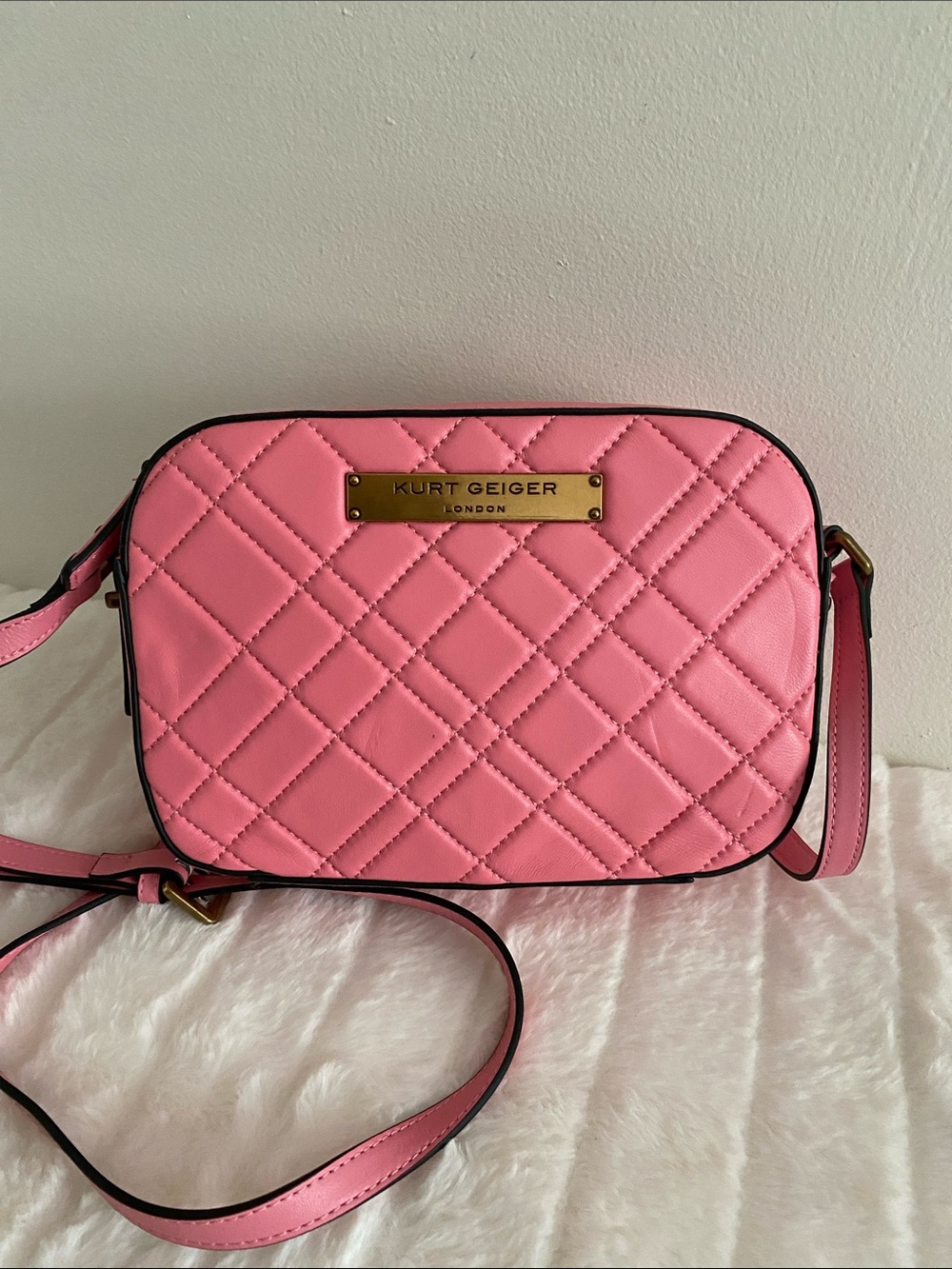 The Kurt Geiger London Quilted Lambskin Leather Crossbody Camera Bag in Pink